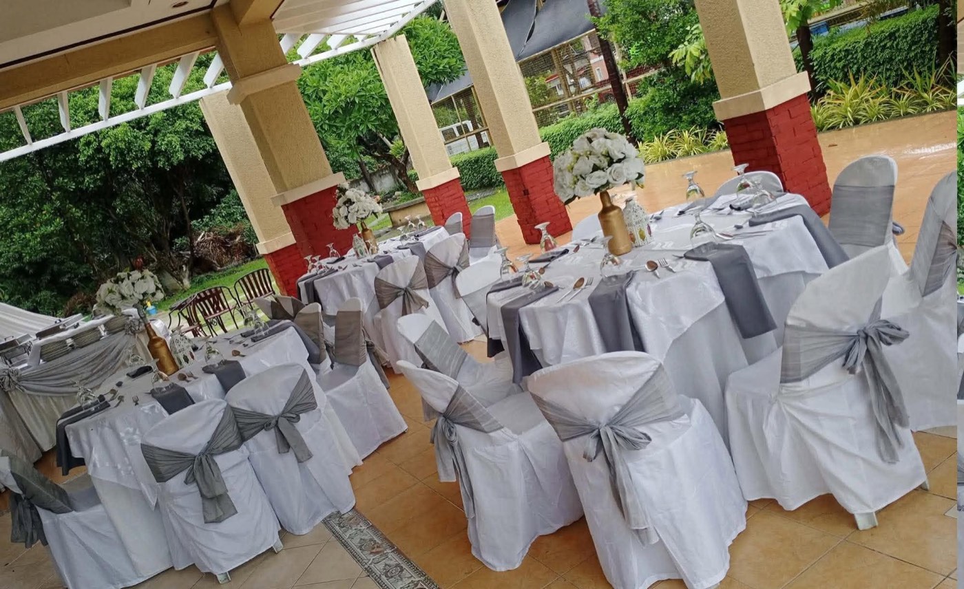 A real elegant white and silver pavilion reception setup