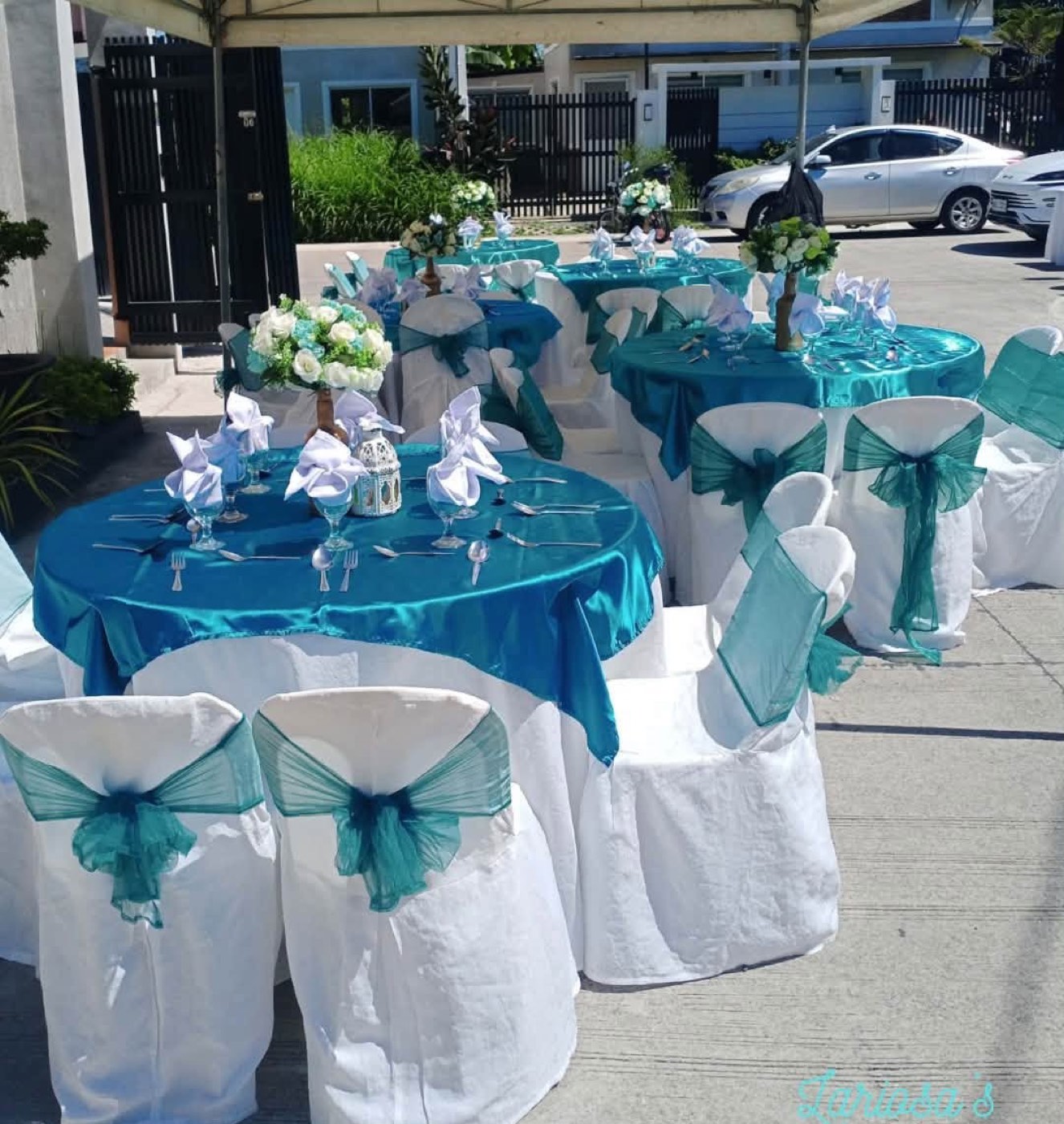 A real outdoor teal-themed table and chair styling